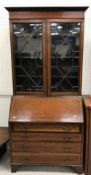 An Edwardian mahogany and satinwood band