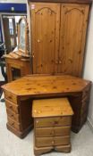 A modern pine two door wardrobe, a corne