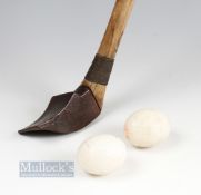 19thc Flemish/French Chloe iron club and 2x white composite balls - fitted with octagonal shaft