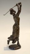 Heavy Bronzed Brass golfing figure of 1920s lady Golfer - mounted an oval base - overall 12.75