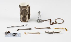 Golfing brooches and Tie clips features 4x golf club brooches one stamped 'Sterling', a tie clip