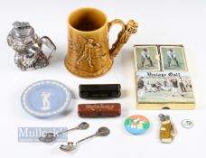 Dartmouth Golfing Tankard with crazing throughout, together with a Golfing figure Table lighter,