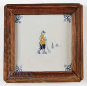 An Early 20thc Dutch Delft Kolf/Golf hand coloured painted tile - mounted in a wooden frame 6.75