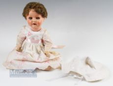 Heubach Koppelsdorf Antique German Child doll 320.2/0, with bisque head glass eyes and 2 front teeth