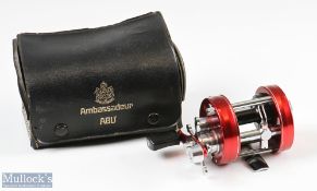 ABU Ambassadeur 2500C multiplying reel in red finish, foot stamped 070007, counterbalance handle,