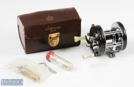 ABU Ambassadeur 5000C multiplying reel in black finish, foot stamped 67839 twin handle, very light