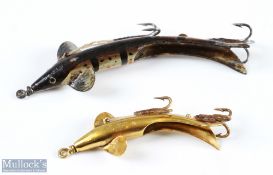 Patent Titbit curved hollow metal baits one measuring 3 ¼