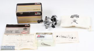 ABU Ambassadeur 1500C bait casting reel in grey, foot stamped 89-0-89-90, year 1989,