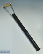 Vintage Golf Ball retriever with a wood and metal handle attached to a split open edged bottom tin