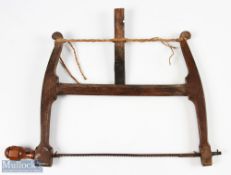 Small Clubmakers bow saw stamped with the oval D&W Auchterlonie St Andrews stamp mark to the one arm
