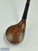 Fine James Braid Signature light stained persimmon brassie with central black fibre face insert with