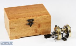 ABU Ambassadeur 1500C multiplier reel in gold colour 1997 numbered to foot 070007, gold line arbour,