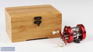 ABU Ambassadeur 2500C multiplier reel in nostalgia red foot stamped 070008, twin pearl handles,