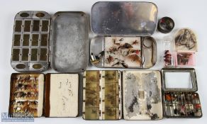 A collection of fly tins all containing flies to include Richard Wheatley 16 window tin, J Bernard &
