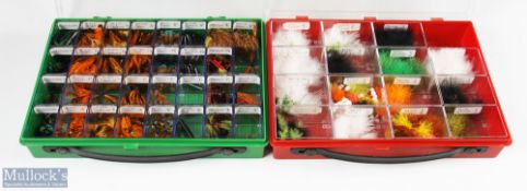 A plastic display case box with 32 compartments with salmon tube flies, made up of Tadpole /