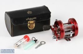 ABU Ambassadeur 5000 multiplier reel in red number to foot rubbed / worn off, early 4 screw version,