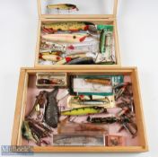 A collection of pike lures in two wooden boxes with Perspex lids, containing Abu / Rapala / Pflueger