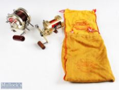 Shimano Calcutta 700 multiplier reel, gold finish with large wood T handle, light use, runs very