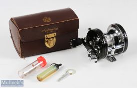 ABU Ambassadeur 5000C multiplier reel in black with counterbalance handle, foot stamped 73980, in