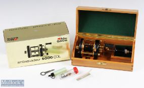 ABU Ambassadeur 5000 CDL multiplier reel bait casting reel in black with gold plated fittings,