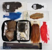 Fly Tying Fishing Capes, Feathers Furs, to include a stone bag with assorted furs, a collection of