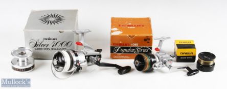 Daiwa silver 4000 skirted spool spinning reel to ball bearings strong bail arm runs very well plus