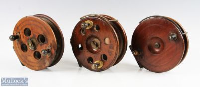 A collection of large star back wood reels, to include: unnamed 7