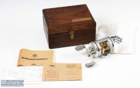 ABU Ambassadeur 5500CDL Bass Pro limited edition multiplier reel in silver, with fishing scene to