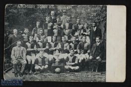 1903/1904 Grimsby Town b&w postcard team group, players named, features the Lincolnshire Cup (Town