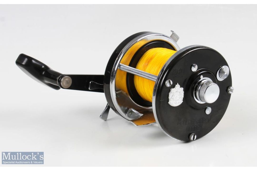 ABU Ambassadeur 9000C multiplier reel, in black, numbered to foot 800400, end tension adjuster, runs - Image 1 of 2