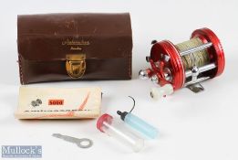 ABU Ambassadeur 6000 multiplier reel, in red, foot unnumbered with slight bend, sliding line