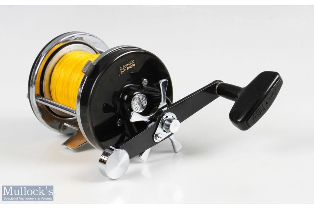 ABU Ambassadeur 9000C multiplier reel, in black, numbered to foot 800400, end tension adjuster, runs - Image 2 of 2
