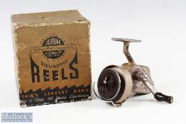 J W Young & Sons The Ambidex spinning reel, runs smooth shows heavy signs of use, in makers box