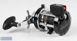 ABU Garcia Ambassadeur 7000i Syncro LC multiplier reel, in black, foot numbered 170018 32, sliding