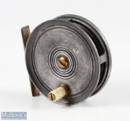 Unnamed 3” alloy trout fly reel, cream handle, brass centre screw and foot, marked to rear Made in