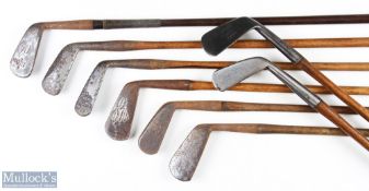 7x Various golf irons - features W Thomson of Brighton mid iron, indistinct Tom Stewart driving