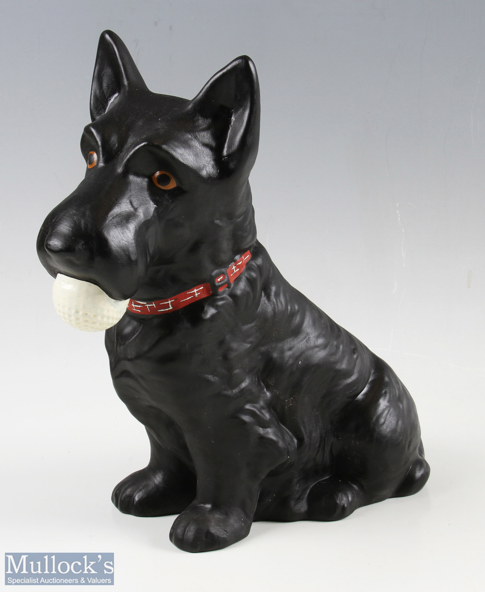 Reproduction Scottie golf advertising figure - depicting seated Scottie dog with golf ball in mouth,