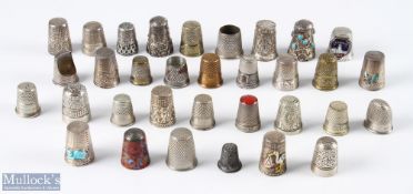 Mixed selection of 33 assorted thimbles with brass, enamelled and white metal examples, mixed