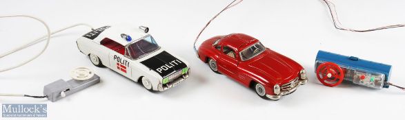 Two Tinplated Battery-Operated Remote-Controlled Cars SKK, Japan Mercedes Benz 300 SL in red with