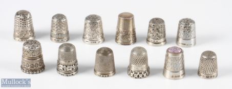 Group of 12 assorted hallmarked silver thimbles, with mixed designs and makers including Charles