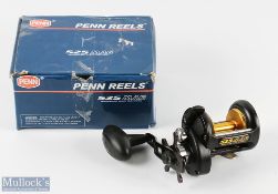 Penn, USA 525 Mag Multiplier Reel with fast/slow slider, black handle, gold colour spool, with