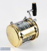 Penn International 80-W Big Game Multiplier Reel in gold finish, lever drag, black handle, serial