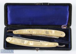 Interesting set of 2x open razors with angler holding catch inlay to handle, and gilt and etched