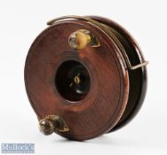 Interesting large star back mahogany and brass reel, 6