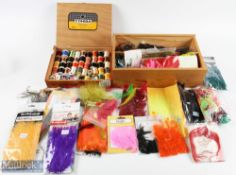 Wooden wine case containing over 40 packs of fly tying material, mainly feathers by Veriard,