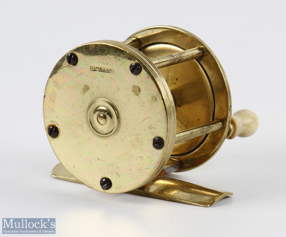 D Murray 2 1/4" brass crank wind reel, white handle, stamped makers mark rear plate, brass foot - Image 2 of 2