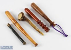 A collection of priests made up of 3x wood, 1x horn, and 1x metal