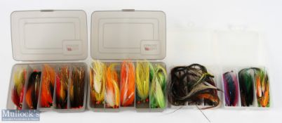 Over 100 tube flies in 2x Abu and 2x trout and salmon plastic containers, all look unused (4)