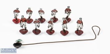 Newfooty complete team in maroon shirts, white shorts