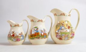 Royal Doulton Bunnykins collection of Albion jugs, tallest 15cm. (3)